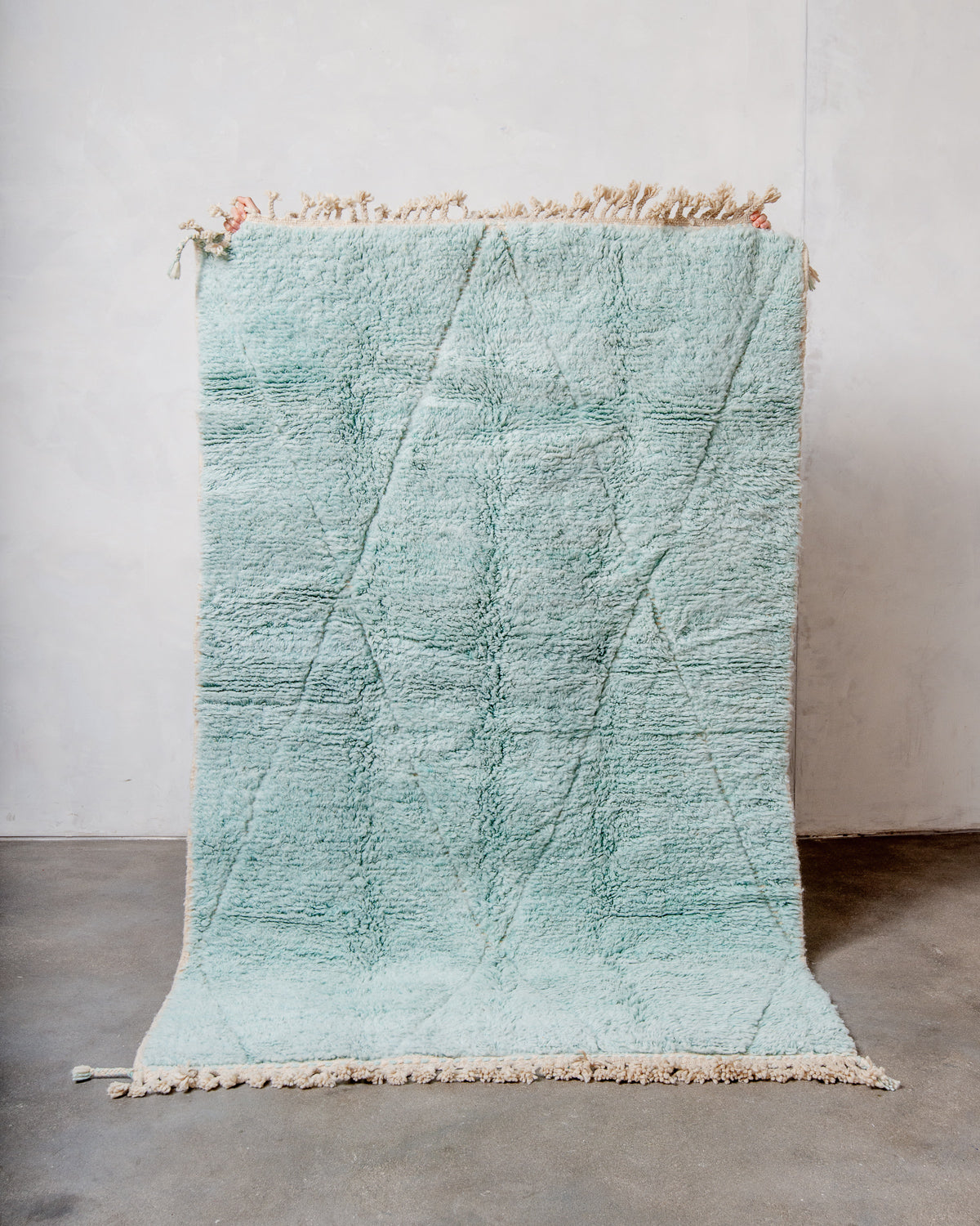 Modern, designer, handcrafted Berber rug from Morocco. Beniourain carpet with beautiful colours and patterns and fluffy wool texture.